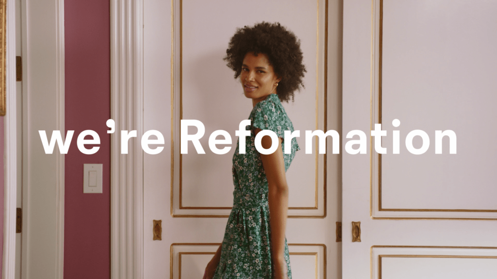 Model dancing in Reformation's 2022 campaign